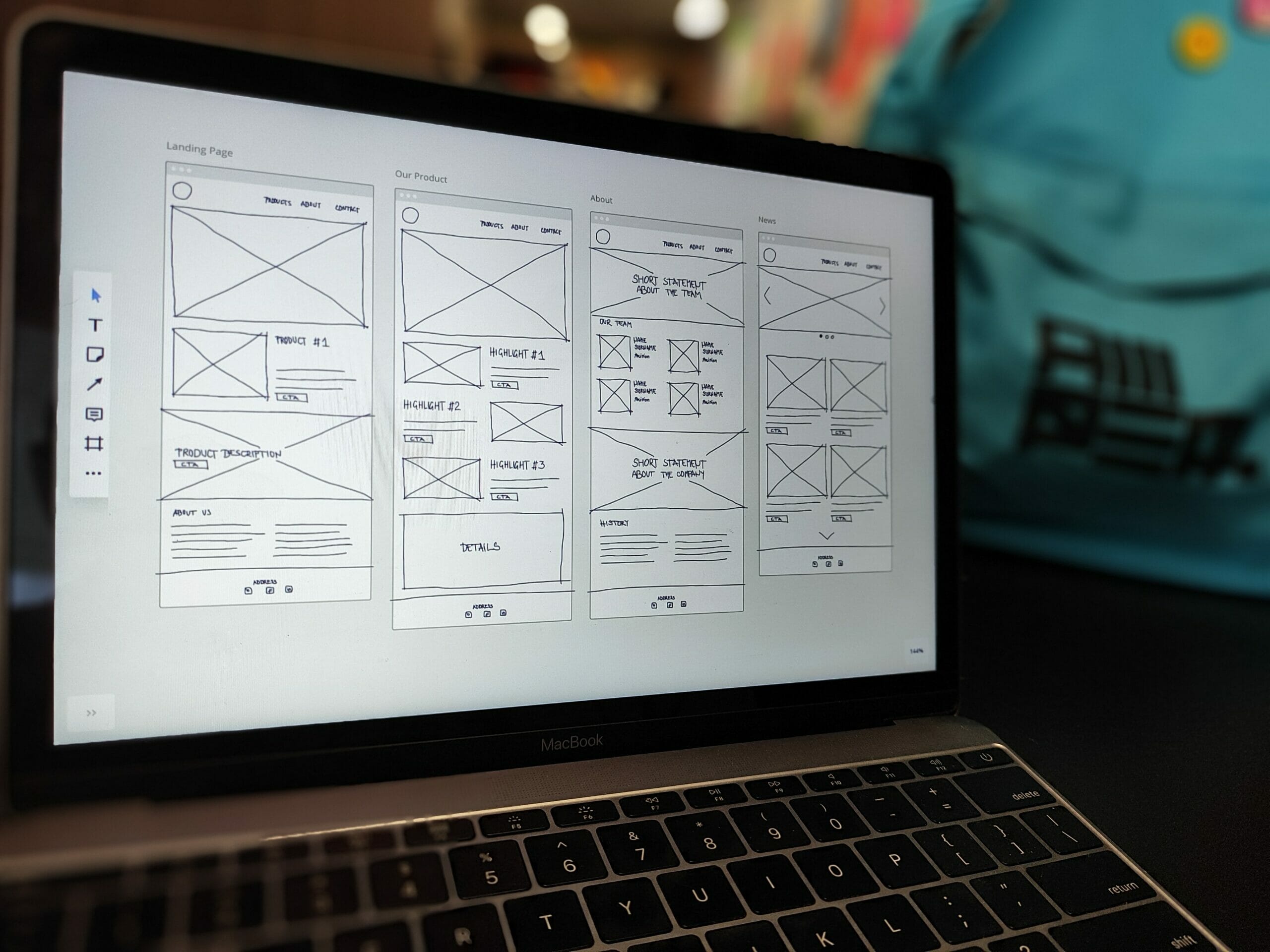 Laptop screen showing UX wireframe system designed by website design agency