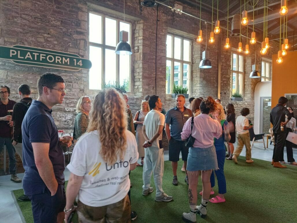 Unfold project manager speaking to guests at meetup for Bristol tech community